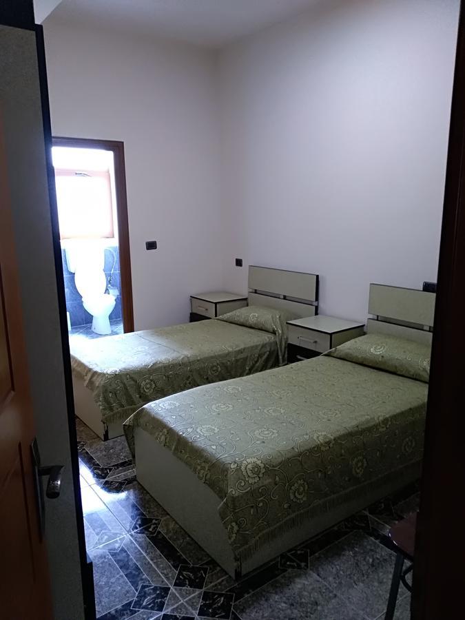 Hotel Gjeli Fier Bagian luar foto